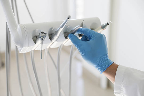 Professional Tooth Extraction technician working in Woodbine, GA